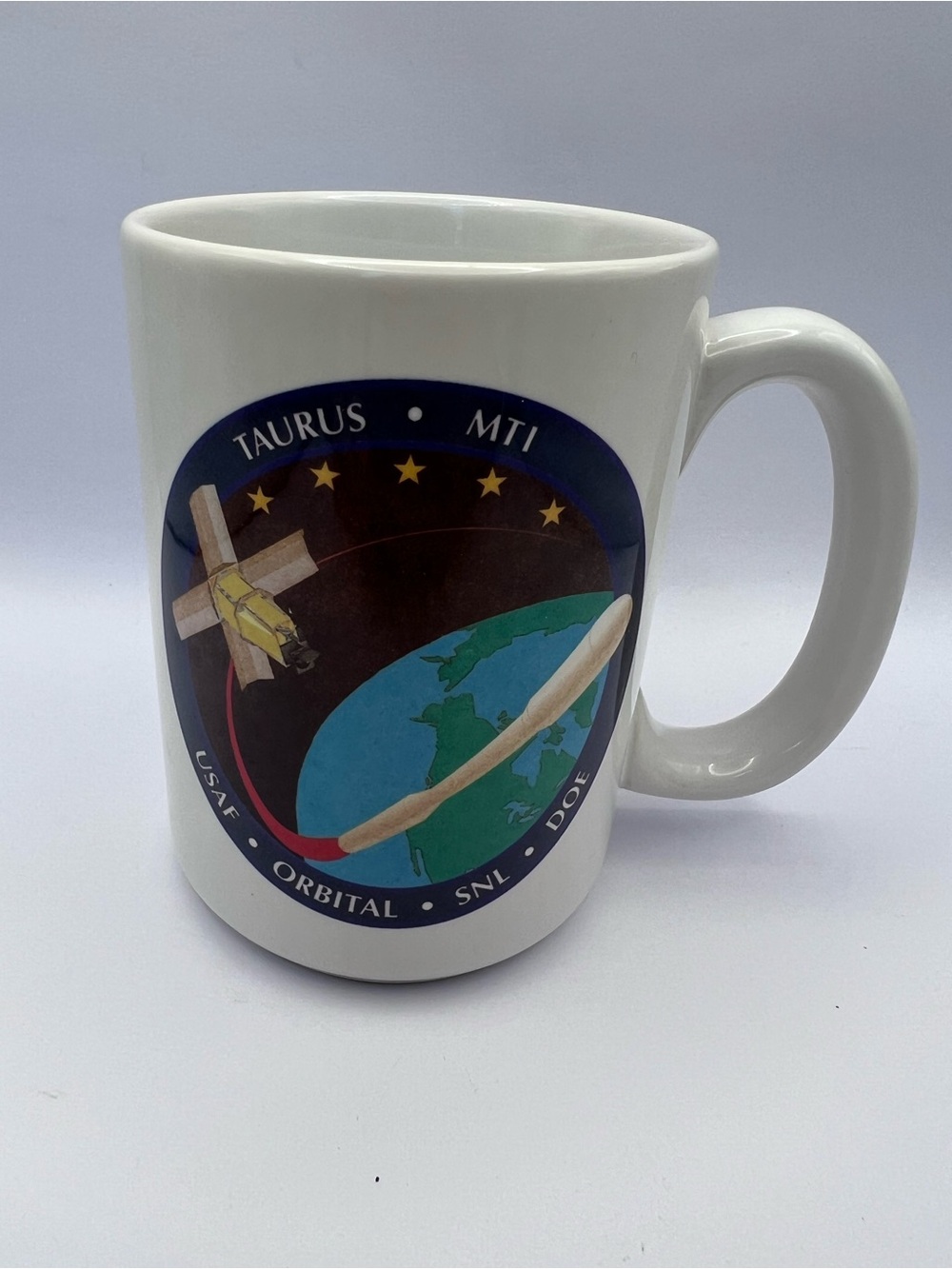 [NASA] [USAF] SATELLITES & ROCKETS: "ORBITAL- TAURUS- MTI- SNL- DOE", Coffee Mug